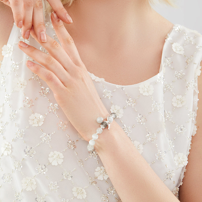 Delicate Butterfly Charm Bracelet with Cat's Eye Stone in Sterling Silver