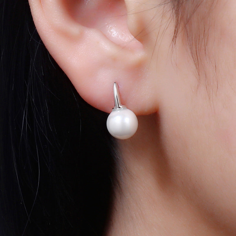 Luminous Pearl Stud Earrings in Sterling Silver