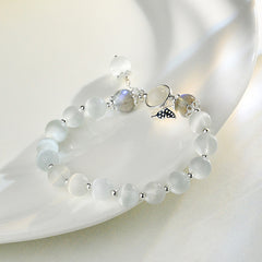 Delicate Butterfly Charm Bracelet with Cat's Eye Stone in Sterling Silver