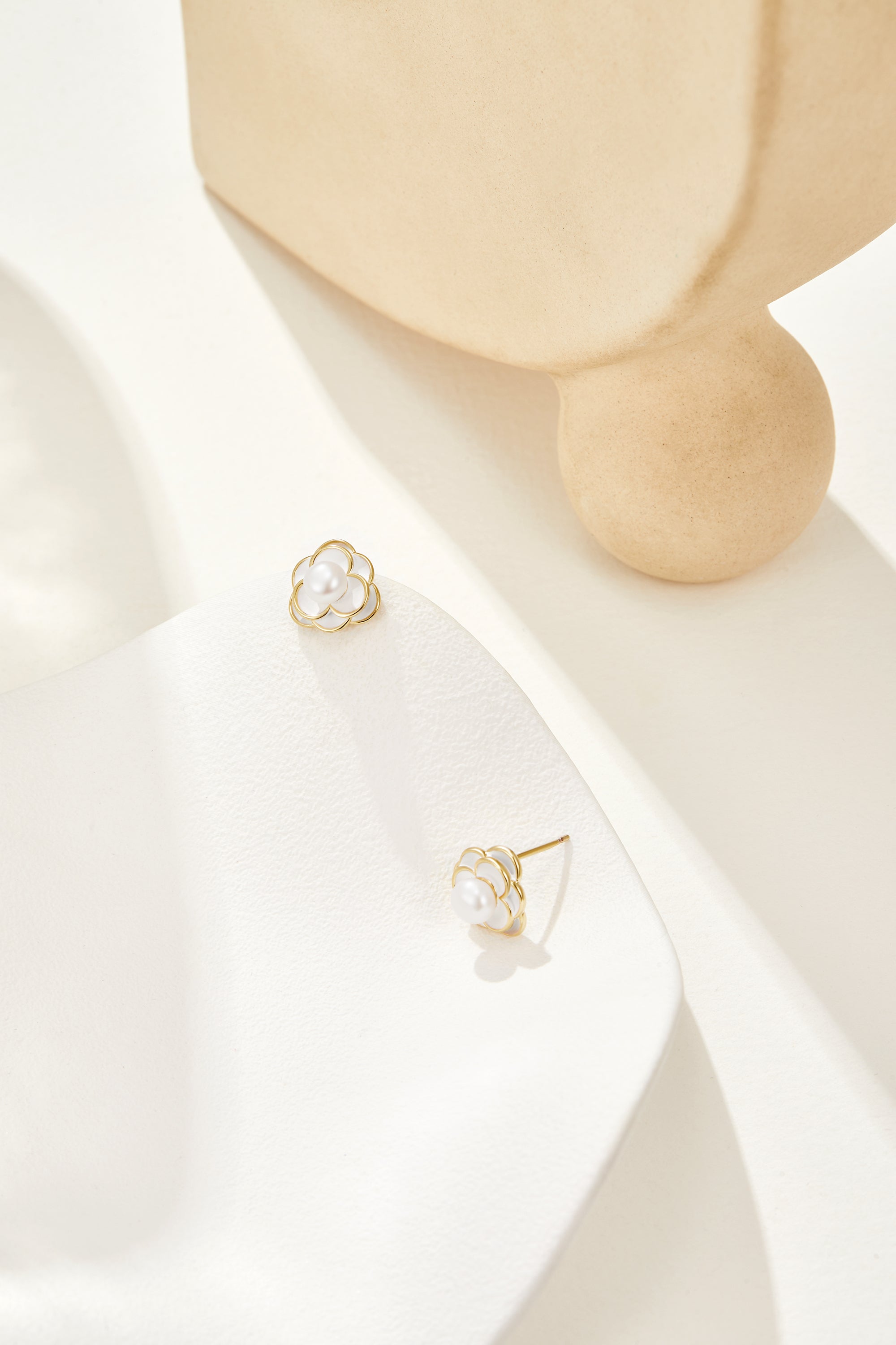 Luminous Freshwater Pearl Stud Earrings with Delicate Silver Accents