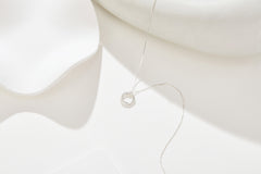 Interwoven Elegance: Sterling Silver Triple Circle Necklace