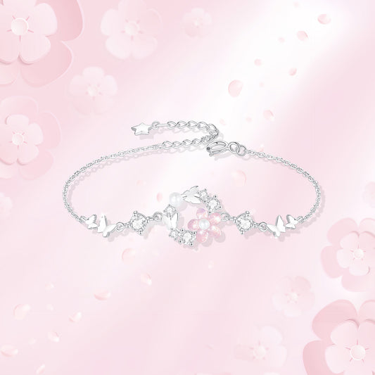 Delicate Pearl and Cubic Zirconia Flower Butterfly Charm Bracelet in Sterling Silver