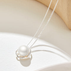 Unveiling the Story: Geometric Pearl Necklace with a Hidden Narrative