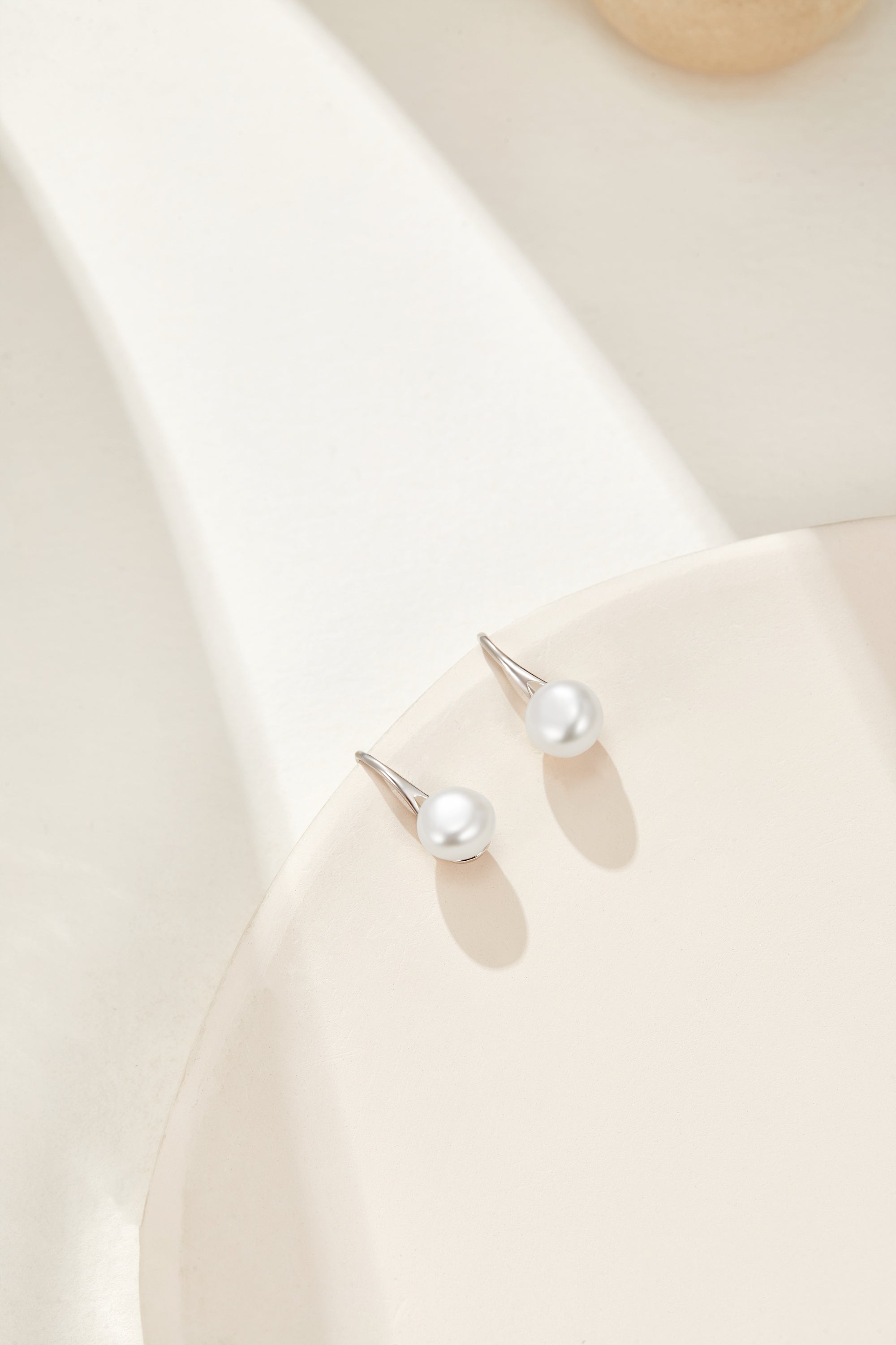Shimmering Pearl and Silver Earrings